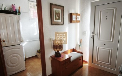 Просторный бунгало с общим бассейном и теннисным кортом, расположенный рядом с гольф-клубом.